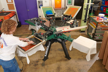 The V-2000 press can print all heads down for jobs up to six colors, or print different jobs simultaneously.